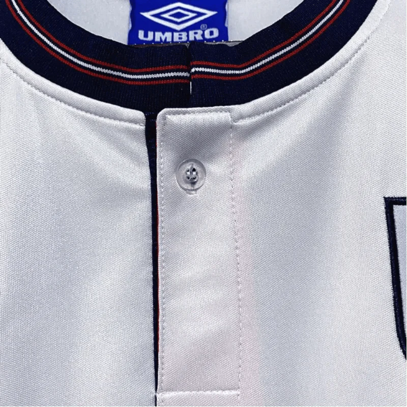 https://cdn.shopify.com/s/files/1/0826/7228/8075/files/1989-england-home-retro-kit-152337.webp?v=1741196957