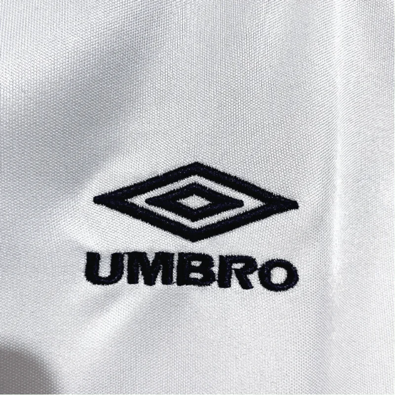 https://cdn.shopify.com/s/files/1/0826/7228/8075/files/1989-england-home-retro-kit-325606.webp?v=1741196959