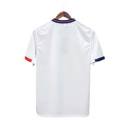 https://cdn.shopify.com/s/files/1/0826/7228/8075/files/1989-england-home-retro-kit-480271.webp?v=1741196959