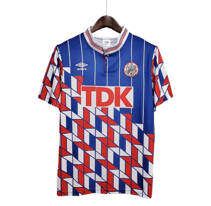 https://cdn.shopify.com/s/files/1/0826/7228/8075/files/19891990-ajax-tdk-away-retro-kit-classickits433-753876.webp?v=1741199347