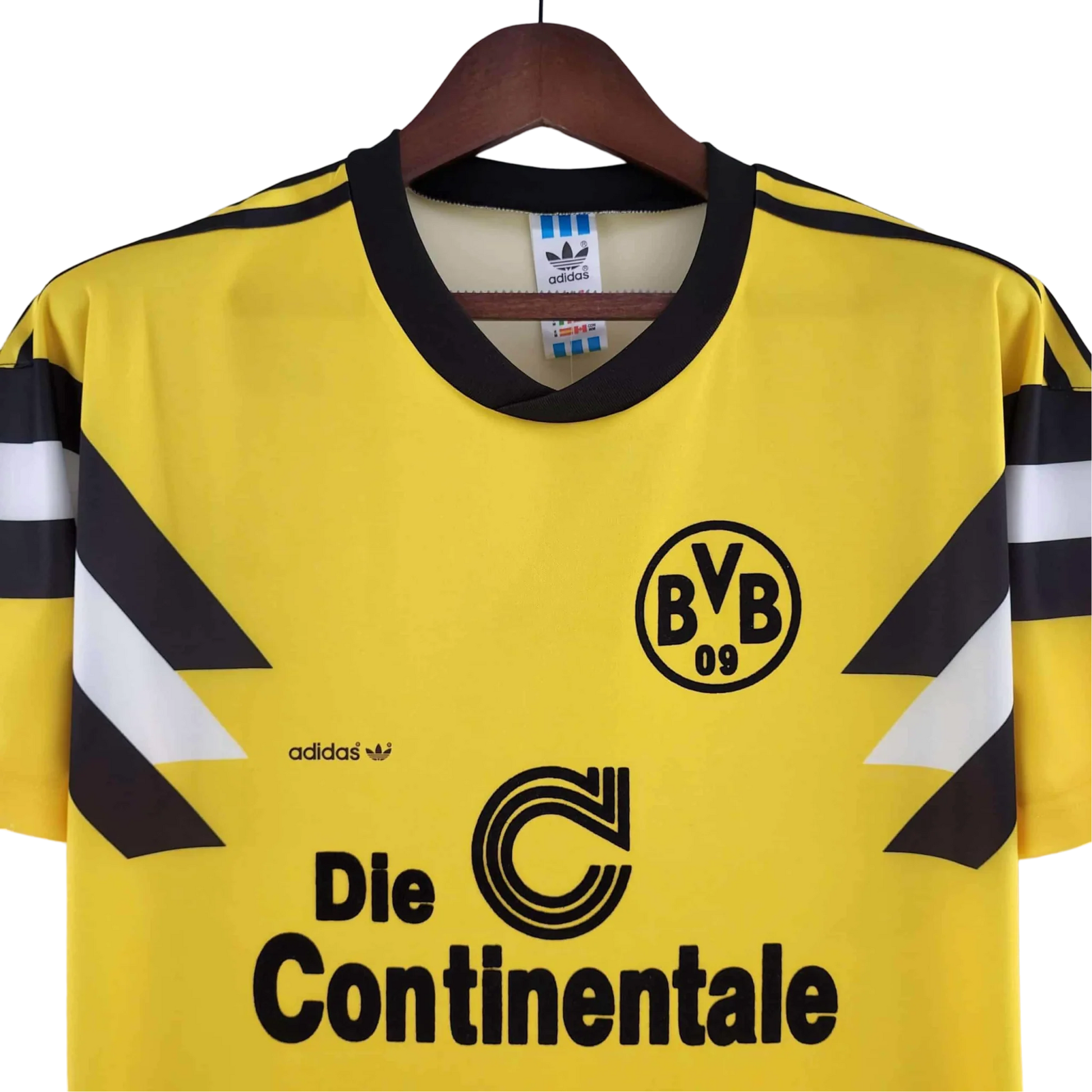https://cdn.shopify.com/s/files/1/0826/7228/8075/files/19891990-borussia-dortmund-continentale-home-retro-kit-classickits433-575564.webp?v=1741199405