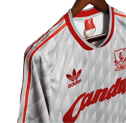 https://cdn.shopify.com/s/files/1/0826/7228/8075/files/19891990-liverpool-candy-away-retro-kit-classickits433-388208.webp?v=1741199190