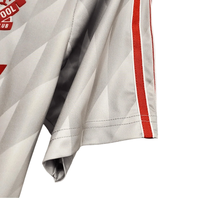 https://cdn.shopify.com/s/files/1/0826/7228/8075/files/19891990-liverpool-candy-away-retro-kit-classickits433-567816.webp?v=1741199191