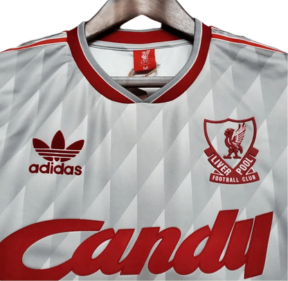https://cdn.shopify.com/s/files/1/0826/7228/8075/files/19891990-liverpool-candy-away-retro-kit-classickits433-847578.webp?v=1741199192