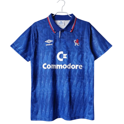 https://cdn.shopify.com/s/files/1/0826/7228/8075/files/19891991-chelsea-commodore-home-retro-kit-classickits433-155987.webp?v=1741199194