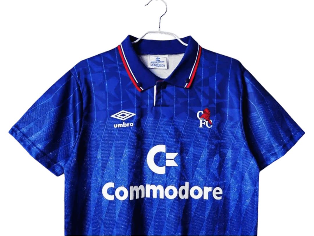 https://cdn.shopify.com/s/files/1/0826/7228/8075/files/19891991-chelsea-commodore-home-retro-kit-classickits433-958874.webp?v=1741199192