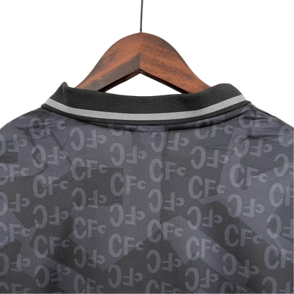 https://cdn.shopify.com/s/files/1/0826/7228/8075/files/1990-chelsea-black-retro-kit-classickits433-753725.webp?v=1741198275