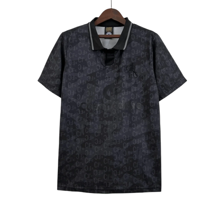 https://cdn.shopify.com/s/files/1/0826/7228/8075/files/1990-chelsea-black-retro-kit-classickits433-818659.webp?v=1741198276