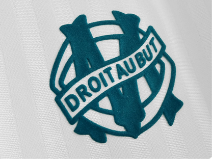 https://cdn.shopify.com/s/files/1/0826/7228/8075/files/1990-olympique-de-marseille-panasonic-home-retro-kit-long-sleeves-476146.webp?v=1741198006