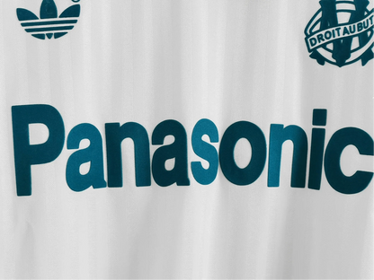https://cdn.shopify.com/s/files/1/0826/7228/8075/files/1990-olympique-de-marseille-panasonic-home-retro-kit-long-sleeves-909796.webp?v=1741198004