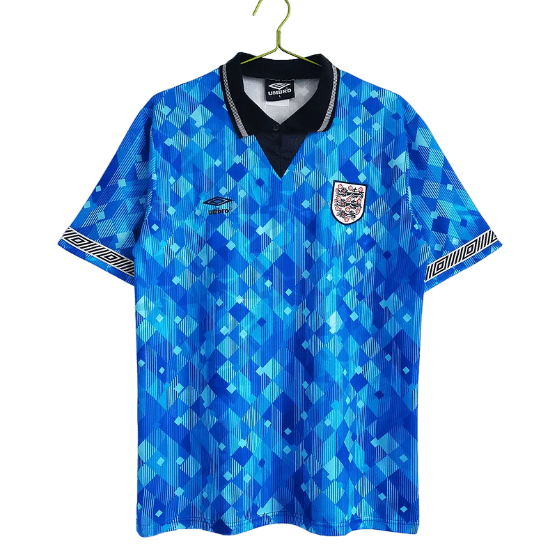 https://cdn.shopify.com/s/files/1/0826/7228/8075/files/19901991-england-blue-third-retro-kit-classickits433-347375.webp?v=1741198469