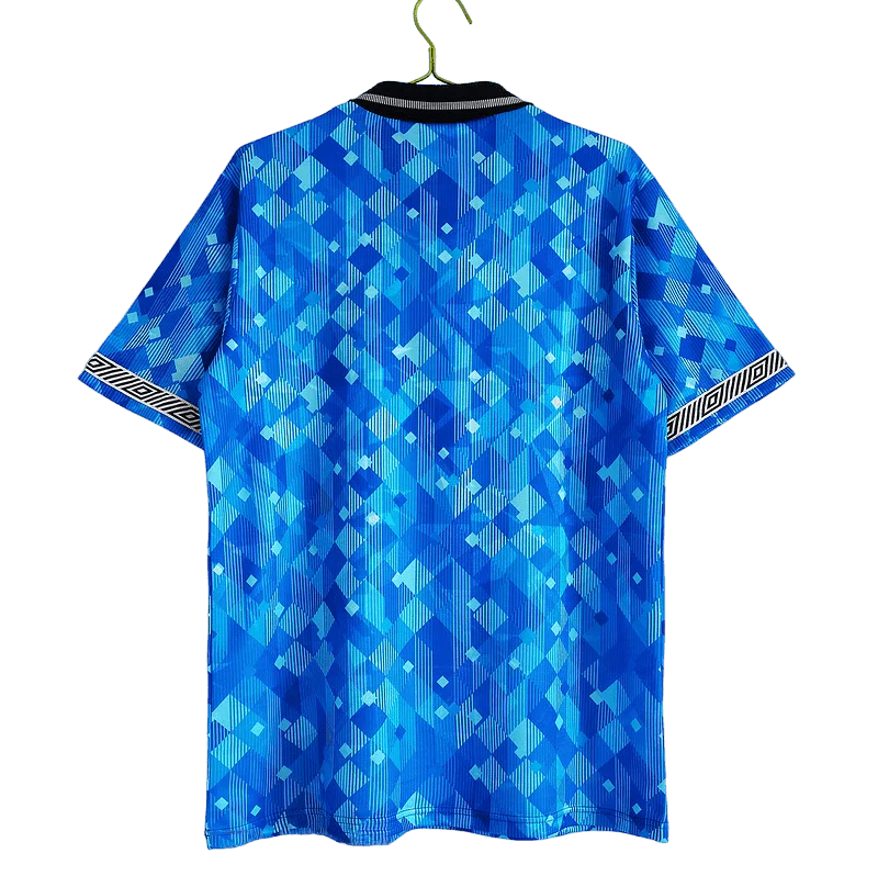 https://cdn.shopify.com/s/files/1/0826/7228/8075/files/19901991-england-blue-third-retro-kit-classickits433-411530.webp?v=1741198469