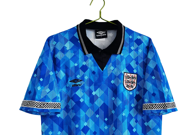 https://cdn.shopify.com/s/files/1/0826/7228/8075/files/19901991-england-blue-third-retro-kit-classickits433-948508.webp?v=1741198508