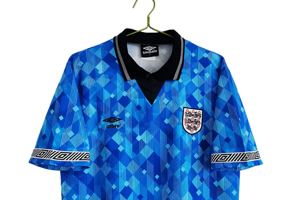 https://cdn.shopify.com/s/files/1/0826/7228/8075/files/19901991-england-blue-third-retro-kit-classickits433-948508.webp?v=1741198508