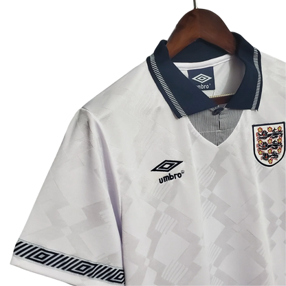 https://cdn.shopify.com/s/files/1/0826/7228/8075/files/19901991-england-home-retro-kit-classickits433-988656.webp?v=1741198520