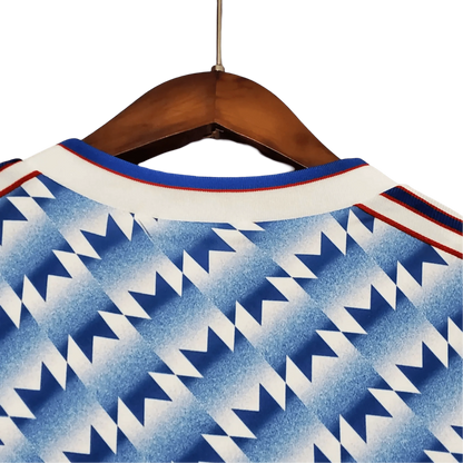 https://cdn.shopify.com/s/files/1/0826/7228/8075/files/19901992-manchester-united-sharp-blue-flower-away-retro-kit-classickits433-524881.webp?v=1741197757