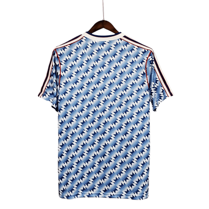 https://cdn.shopify.com/s/files/1/0826/7228/8075/files/19901992-manchester-united-sharp-blue-flower-away-retro-kit-classickits433-532340.webp?v=1741197759
