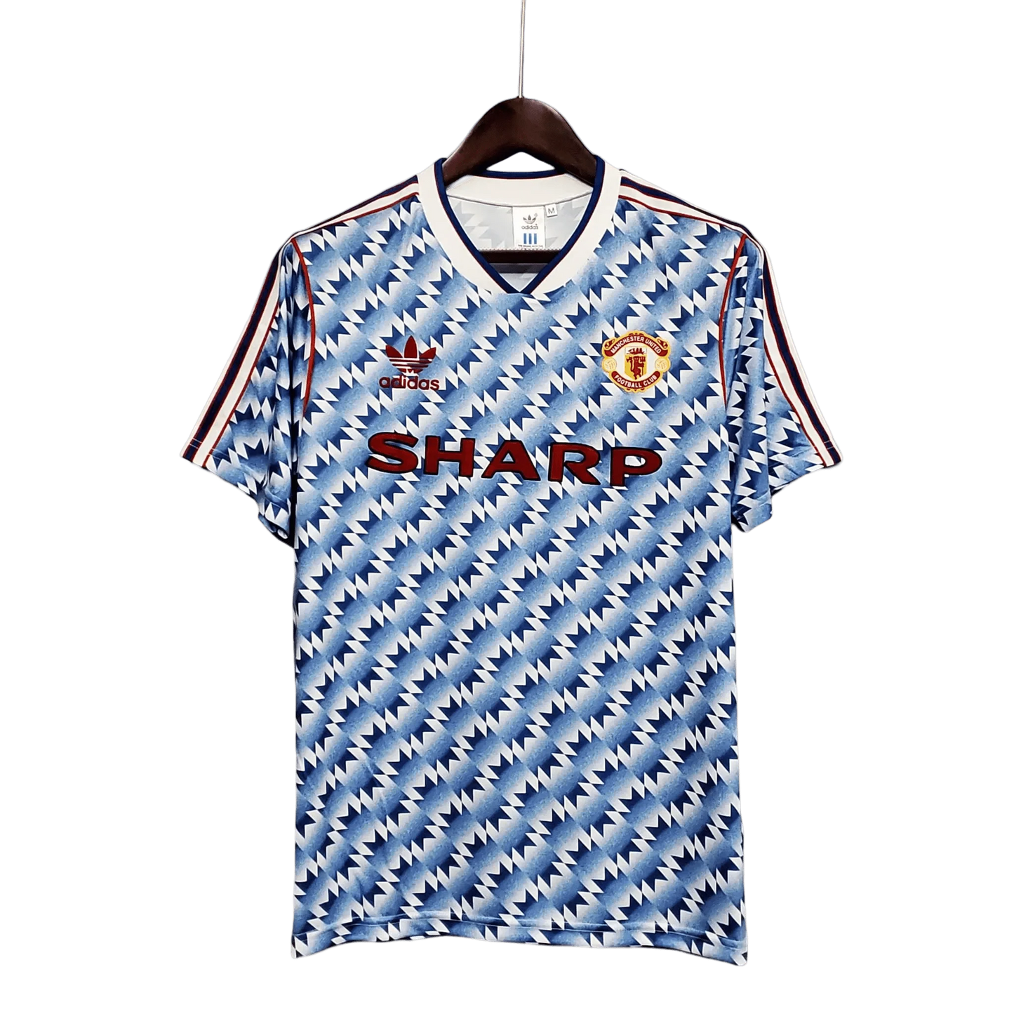 https://cdn.shopify.com/s/files/1/0826/7228/8075/files/19901992-manchester-united-sharp-blue-flower-away-retro-kit-classickits433-718225.webp?v=1741197760