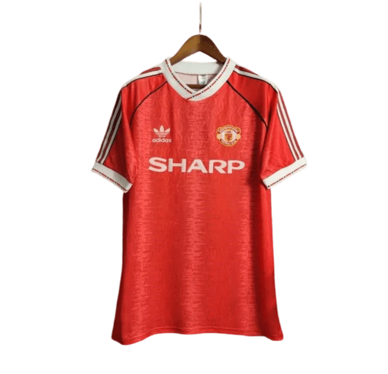 https://cdn.shopify.com/s/files/1/0826/7228/8075/files/19901992-manchester-united-sharp-home-retro-kit-classickits433-773428.webp?v=1747097006