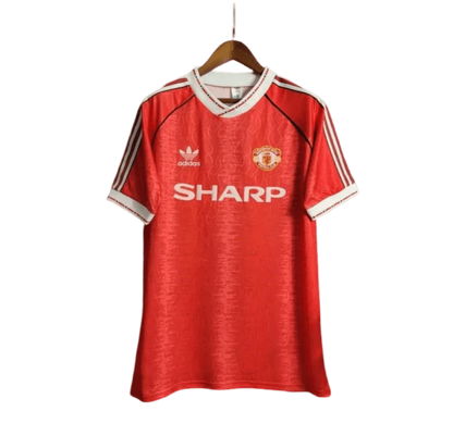 https://cdn.shopify.com/s/files/1/0826/7228/8075/files/19901992-manchester-united-sharp-home-retro-kit-classickits433-773428.webp?v=1747097006