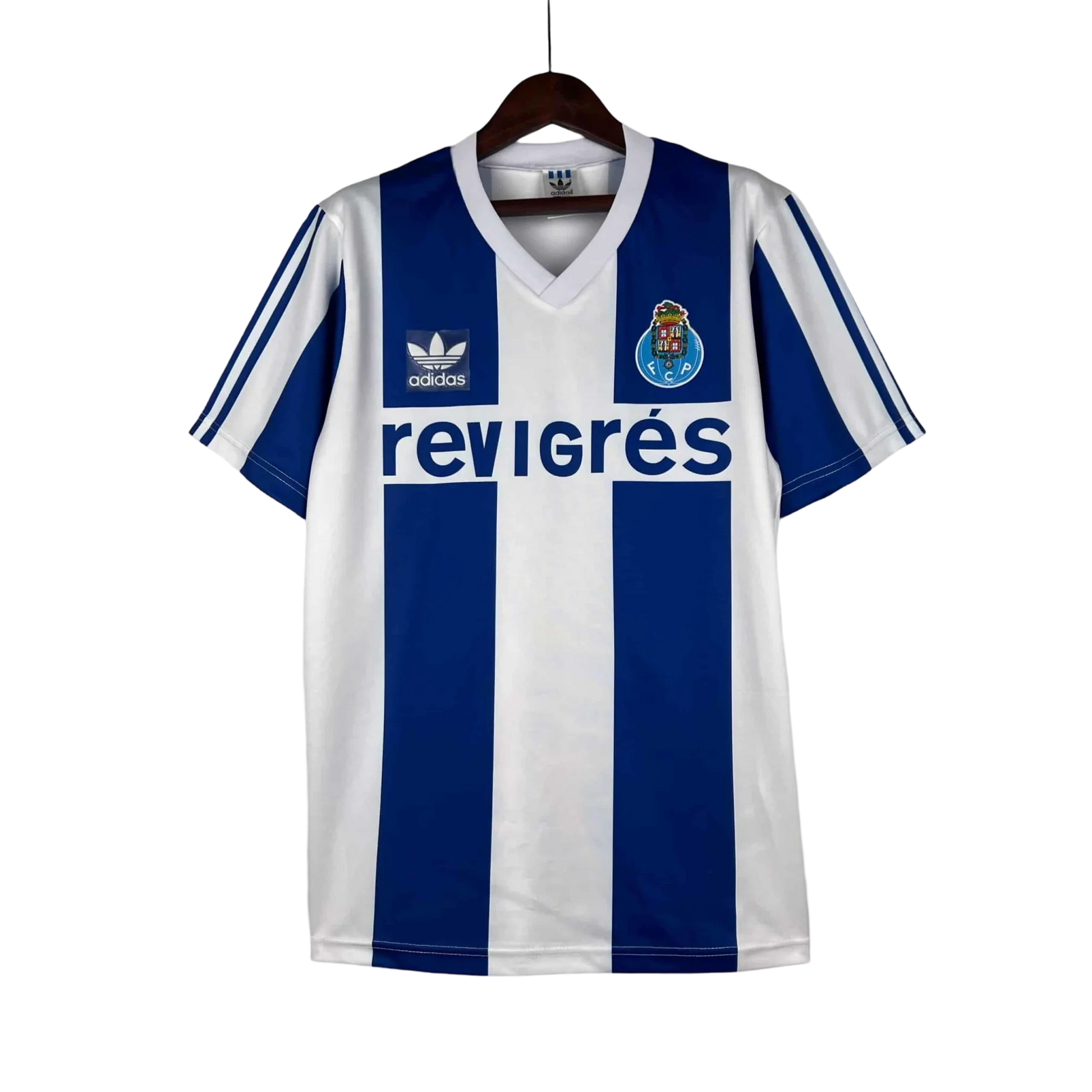 https://cdn.shopify.com/s/files/1/0826/7228/8075/files/19901993-fc-porto-revigres-away-retro-jersey-381573.webp?v=1741199359