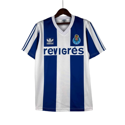 https://cdn.shopify.com/s/files/1/0826/7228/8075/files/19901993-fc-porto-revigres-away-retro-jersey-381573.webp?v=1741199359