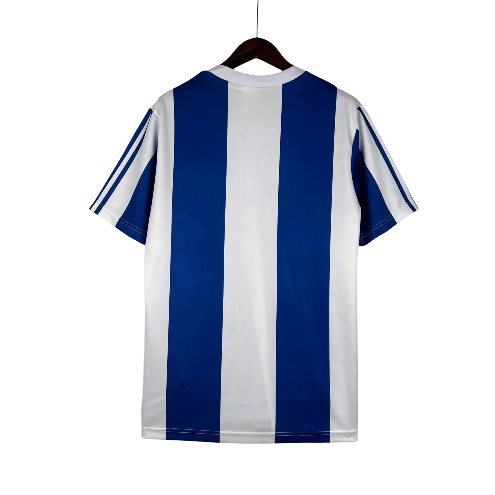 https://cdn.shopify.com/s/files/1/0826/7228/8075/files/19901993-fc-porto-revigres-away-retro-jersey-865502.webp?v=1741199358