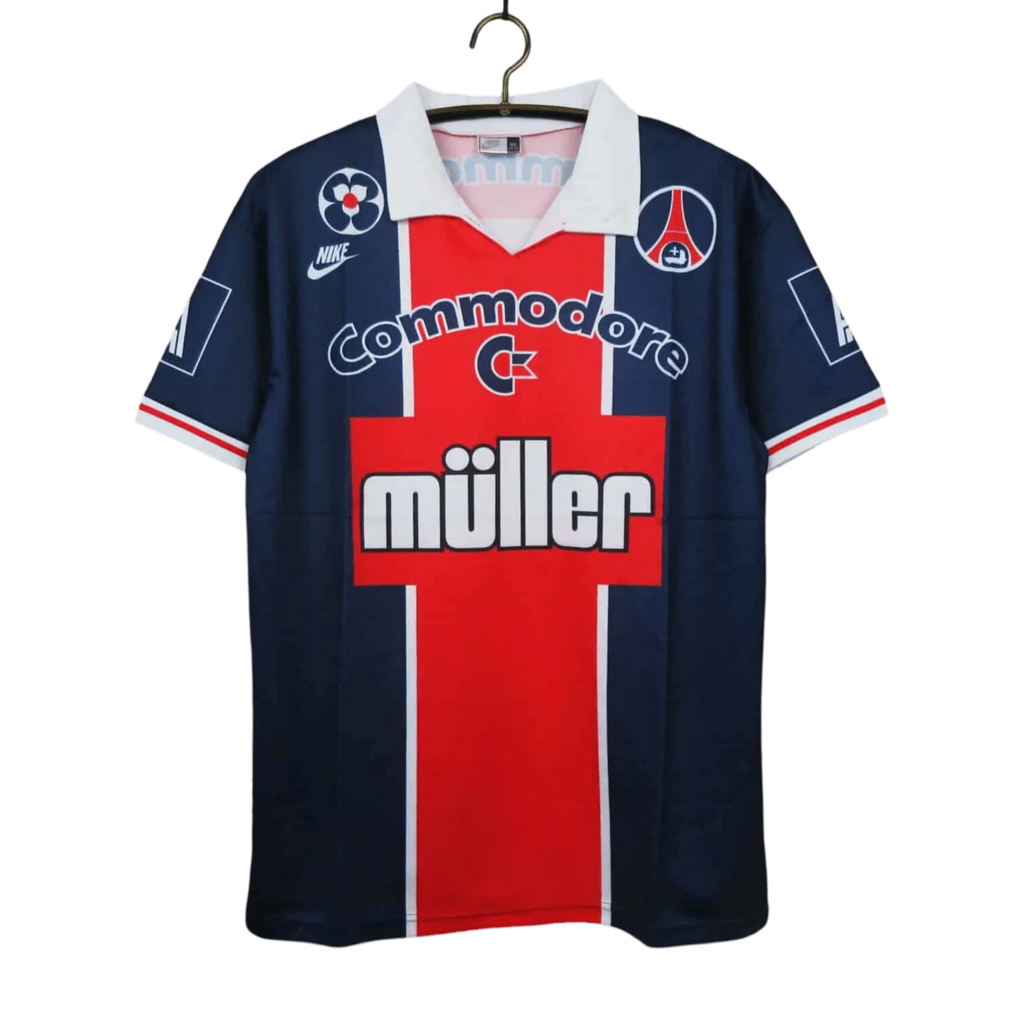https://cdn.shopify.com/s/files/1/0826/7228/8075/files/19911992-paris-saint-germain-commodore-muller-home-retro-jersey-at-govintagejersey-150404.webp?v=1741199407