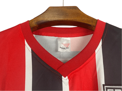 https://cdn.shopify.com/s/files/1/0826/7228/8075/files/19911992-sao-paulo-ibf-formularios-away-retro-jersey-444670.webp?v=1741197156