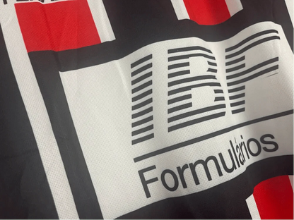 https://cdn.shopify.com/s/files/1/0826/7228/8075/files/19911992-sao-paulo-ibf-formularios-away-retro-jersey-874469.webp?v=1741197156