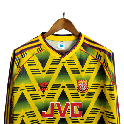 https://cdn.shopify.com/s/files/1/0826/7228/8075/files/19911993-arsenal-jvc-away-retro-kit-long-sleeve-classickits433-969996.webp?v=1741198387