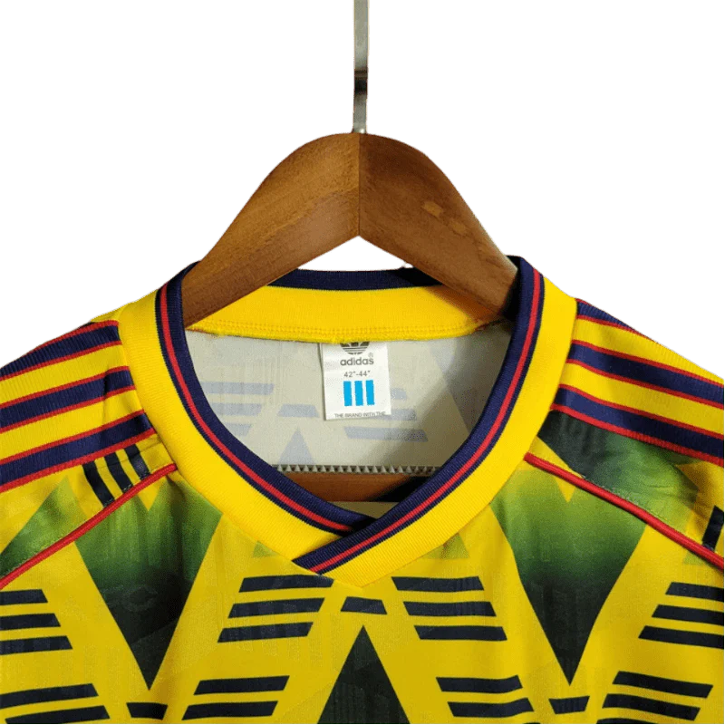 https://cdn.shopify.com/s/files/1/0826/7228/8075/files/19911993-arsenal-jvc-bruised-banana-away-retro-kit-classickits433-548237.webp?v=1741199345