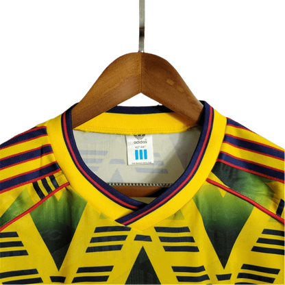 https://cdn.shopify.com/s/files/1/0826/7228/8075/files/19911993-arsenal-jvc-bruised-banana-away-retro-kit-classickits433-548237.webp?v=1741199345
