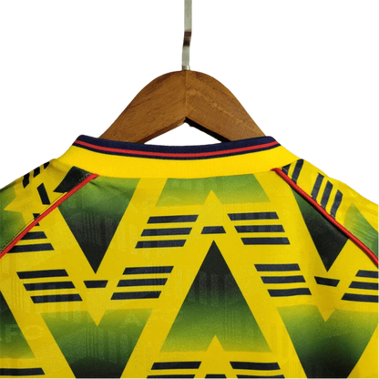 https://cdn.shopify.com/s/files/1/0826/7228/8075/files/19911993-arsenal-jvc-bruised-banana-away-retro-kit-classickits433-707287.webp?v=1741199345