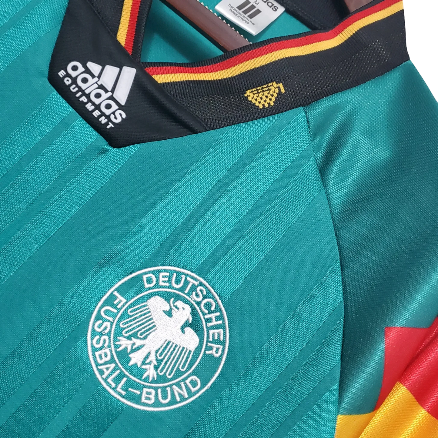https://cdn.shopify.com/s/files/1/0826/7228/8075/files/1992-germany-world-cup-away-retro-kit-248915.webp?v=1741197029