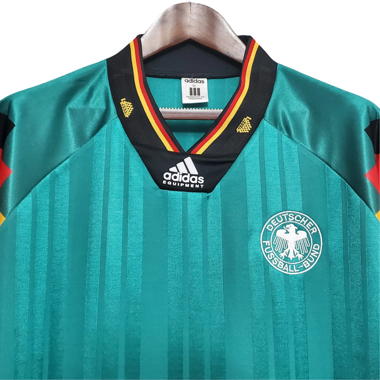 https://cdn.shopify.com/s/files/1/0826/7228/8075/files/1992-germany-world-cup-away-retro-kit-361679.webp?v=1741197028