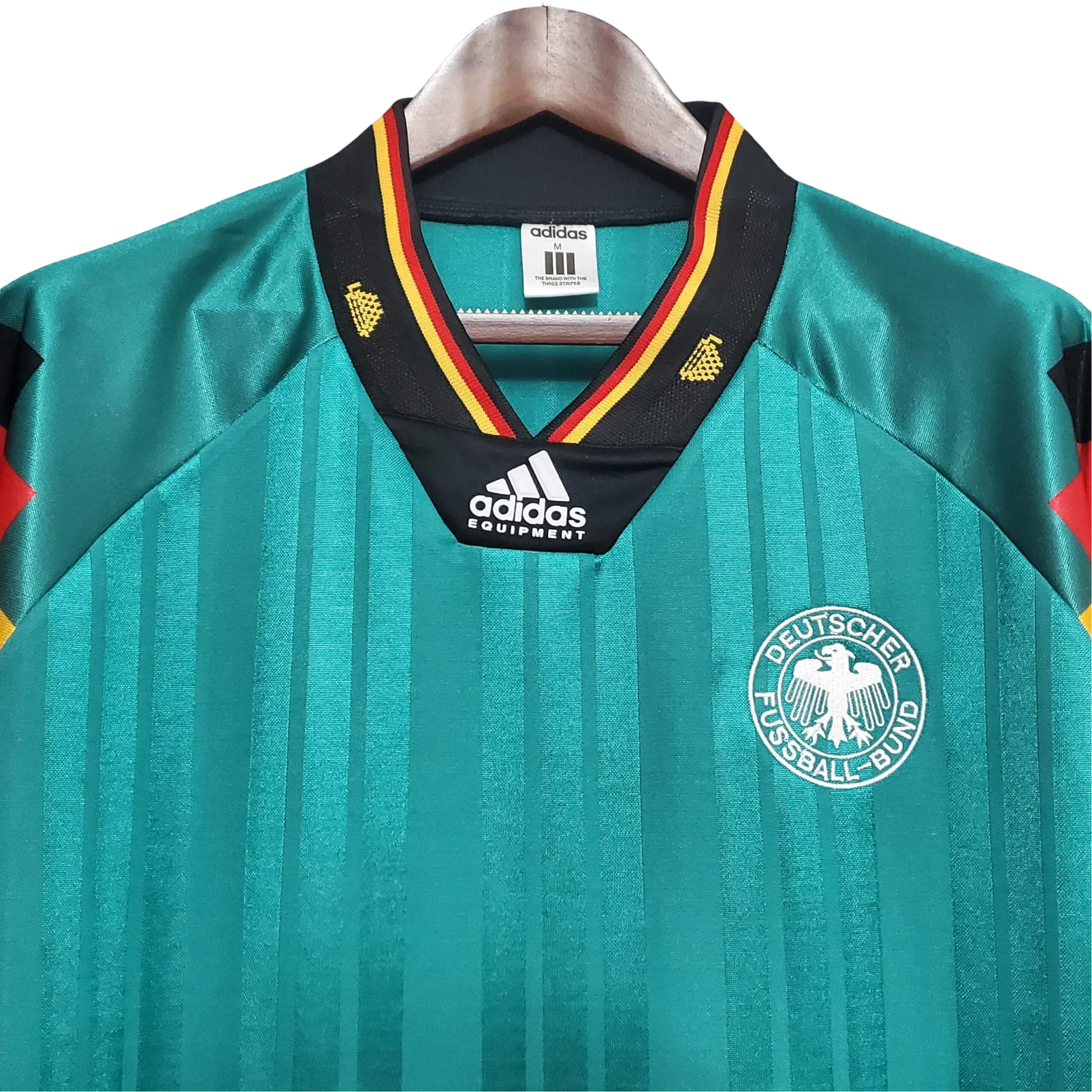 https://cdn.shopify.com/s/files/1/0826/7228/8075/files/1992-germany-world-cup-away-retro-kit-361679.webp?v=1741197028