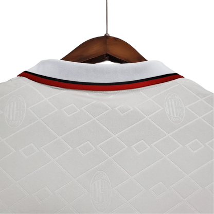 https://cdn.shopify.com/s/files/1/0826/7228/8075/files/19921993-ac-milan-motta-away-retro-kit-govintagejersey-441813.webp?v=1741198857