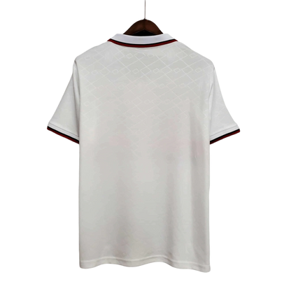 https://cdn.shopify.com/s/files/1/0826/7228/8075/files/19921993-ac-milan-motta-away-retro-kit-govintagejersey-469331.webp?v=1741198854