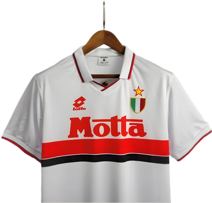 https://cdn.shopify.com/s/files/1/0826/7228/8075/files/19921993-ac-milan-motta-away-retro-kit-govintagejersey-859703.webp?v=1741198856