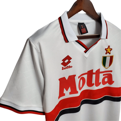 https://cdn.shopify.com/s/files/1/0826/7228/8075/files/19921993-ac-milan-motta-away-retro-kit-govintagejersey-939956.webp?v=1741198856
