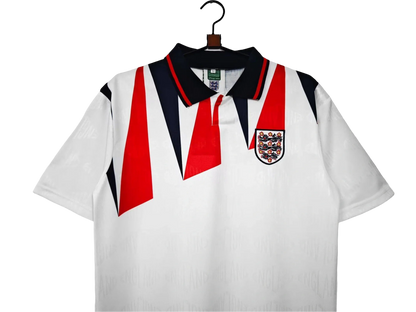 https://cdn.shopify.com/s/files/1/0826/7228/8075/files/19921993-england-home-retro-kit-classickits433-363329.webp?v=1741198472