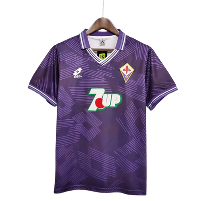 https://cdn.shopify.com/s/files/1/0826/7228/8075/files/19921993-fiorentina-florence-7up-home-retro-kit-govintagejersey-329807.webp?v=1741199020