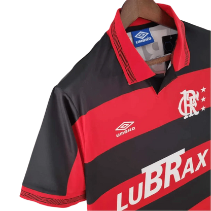 https://cdn.shopify.com/s/files/1/0826/7228/8075/files/19921993-flamengo-lubrax-home-retro-jersey-203322.webp?v=1741197154