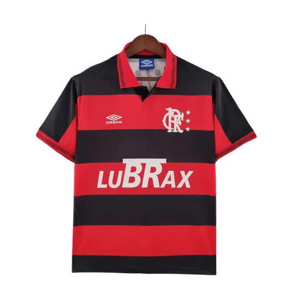 https://cdn.shopify.com/s/files/1/0826/7228/8075/files/19921993-flamengo-lubrax-home-retro-jersey-784580.webp?v=1741197154