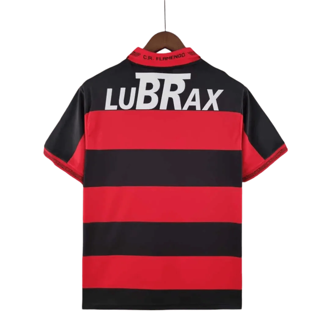 https://cdn.shopify.com/s/files/1/0826/7228/8075/files/19921993-flamengo-lubrax-home-retro-jersey-786395.webp?v=1741197155