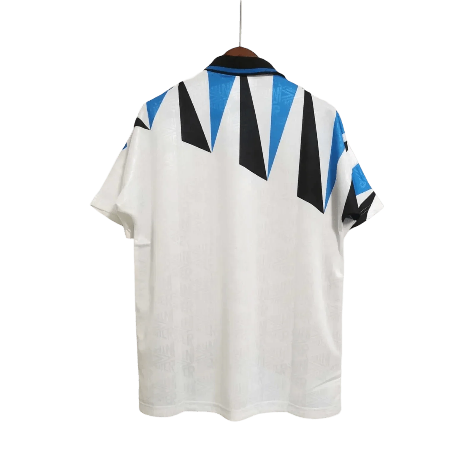 https://cdn.shopify.com/s/files/1/0826/7228/8075/files/19921993-inter-milan-fiorucci-away-retro-kit-134554.webp?v=1741197489