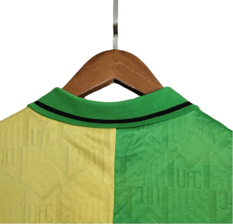 https://cdn.shopify.com/s/files/1/0826/7228/8075/files/19921994-manchester-united-sharp-green-yellow-third-retro-kit-classickits433-528018.webp?v=1741199189