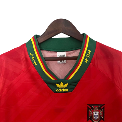 https://cdn.shopify.com/s/files/1/0826/7228/8075/files/19921994-portugal-home-retro-jersey-533019.webp?v=1741198516