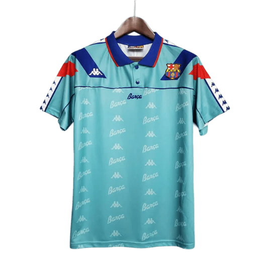https://cdn.shopify.com/s/files/1/0826/7228/8075/files/19921995-fc-barcelona-turquoise-away-retro-kit-classickits433-790892.webp?v=1741199030
